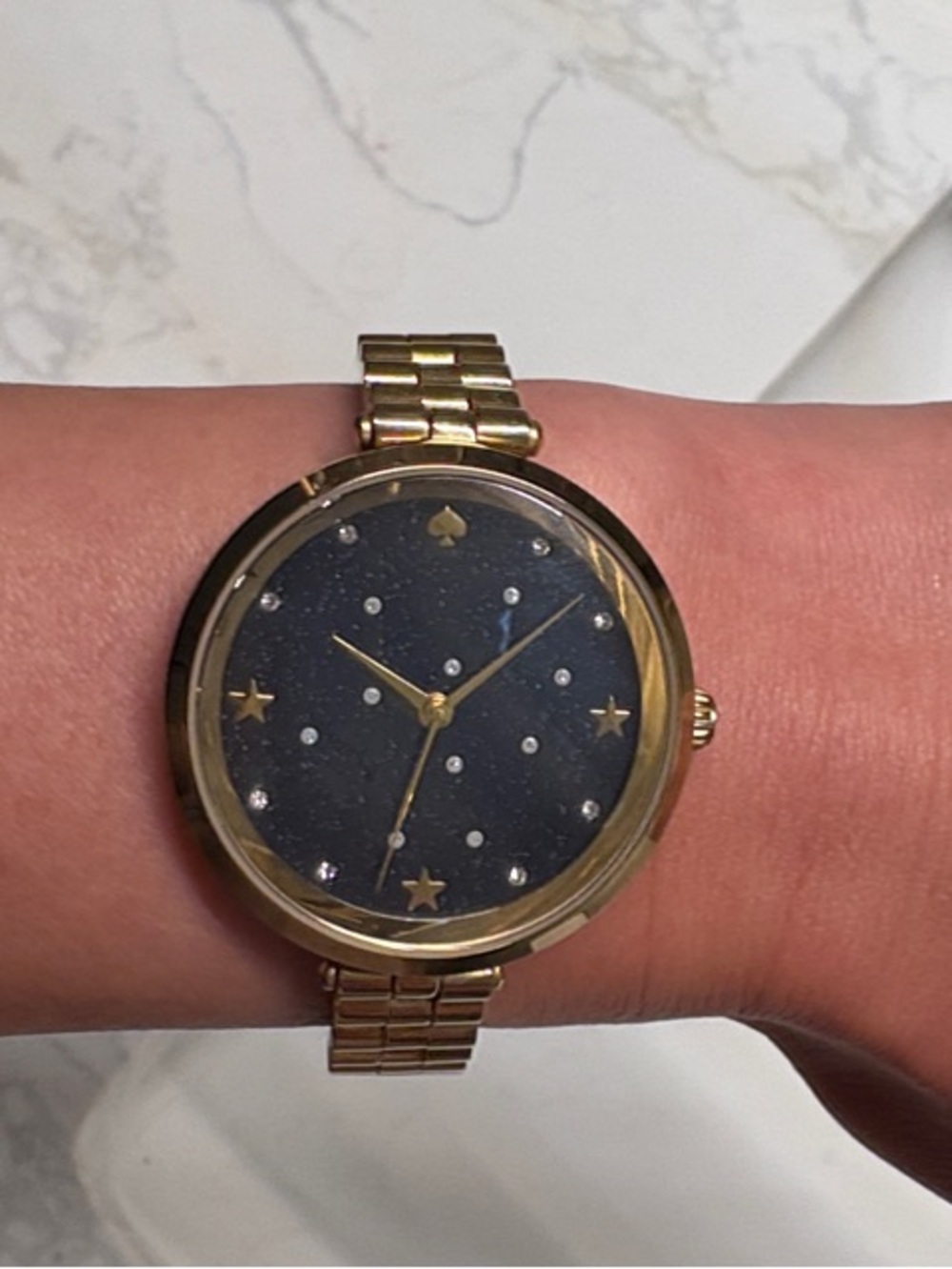 kate spade gold-tone watch with navy star dial